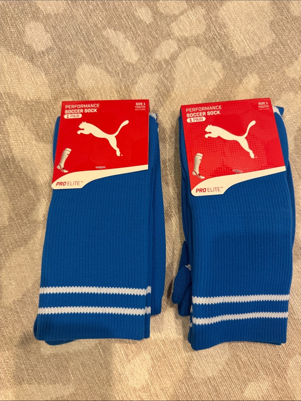 Puma youth, size 1, two pairs, Athletic Soccer Socks in Blue with White Stripe